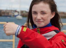Orlaith Kelly from Harold¿s Cross, Dundrum promoting Bord Iascaigh Mhara¿s Live to Tell the Tale safety at sea campaign at the West Pier Dun Laoghaire. Orlaith is a member of Irish Youth Sailing Club that received a set of compact lifejackets with integrated personal locator beacons from Bord Iascaigh Mhara. 